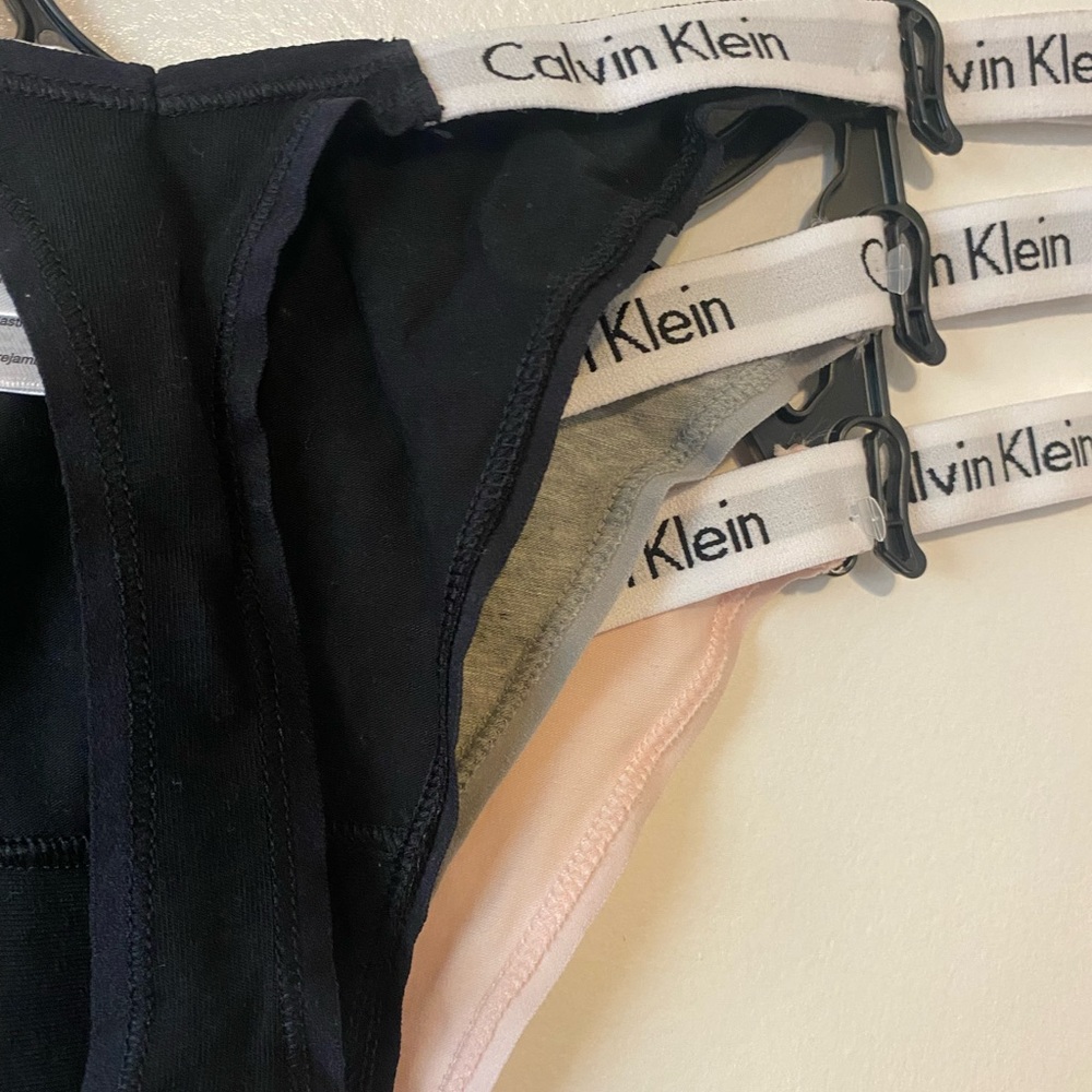 Calvin Klein Black, Gray, and Light Pink Thong Set